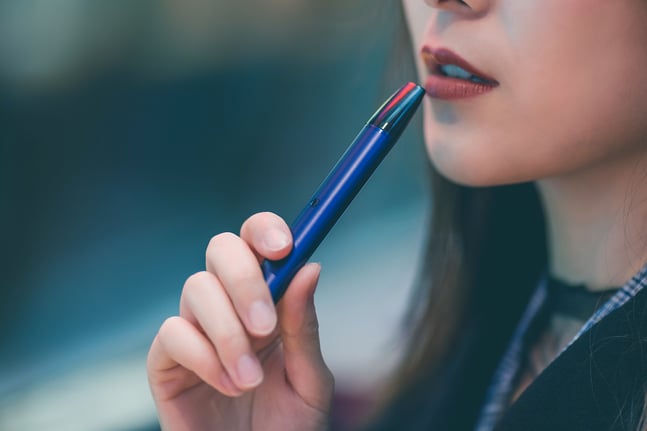 girl vaping