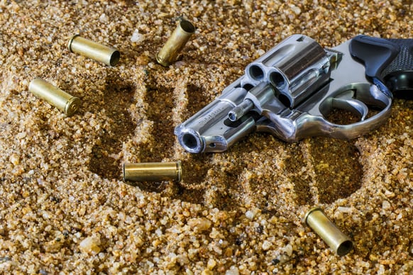 revolver and shell casings